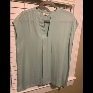 Vince, Size M, Seafoam green sleeveless 100% silk blouse.
